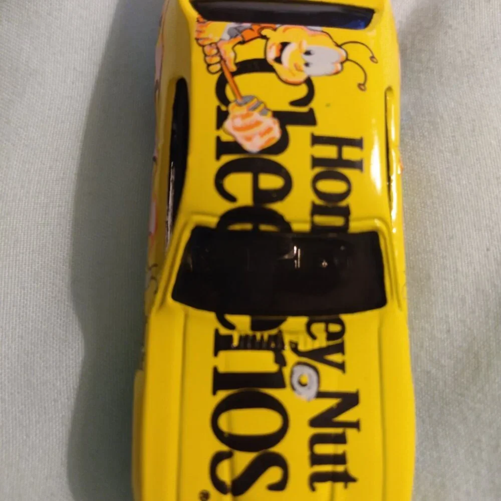 2002 Golden Wheel and 2004 Hot Wheels car